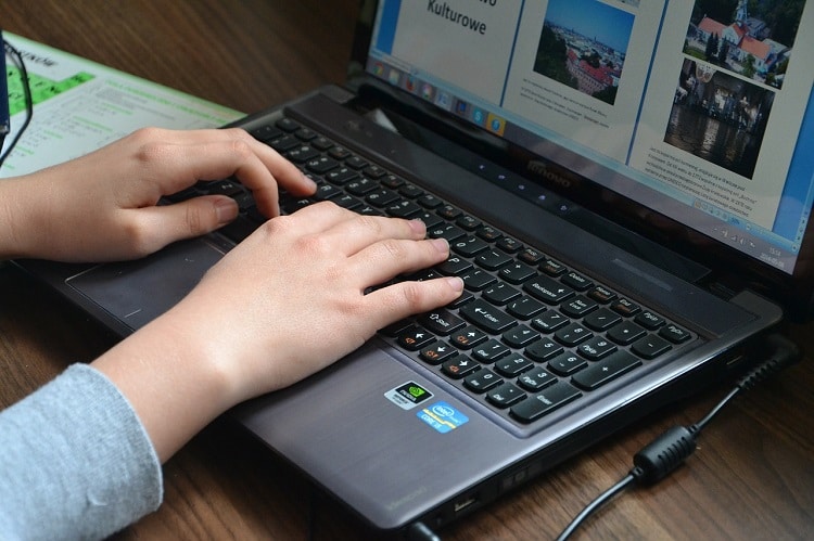 Girl Using Laptop With Quad Core Processor